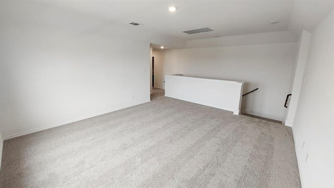 Carpeted spare room with recessed lighting Carpeted spare room with recessed lighting