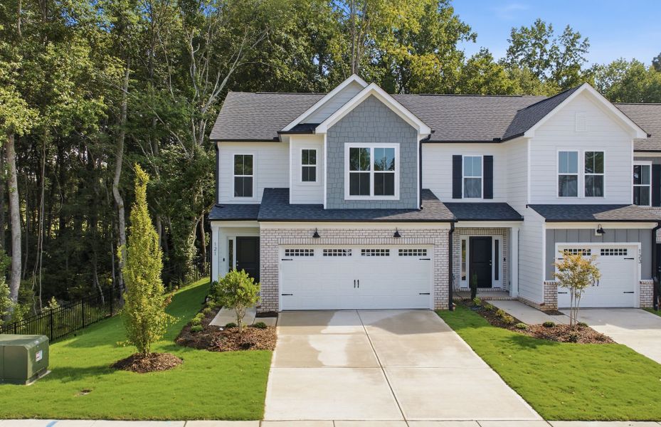 Front exterior of a new home in Cambria, Garner, NC, highlighting curb appeal (Image 27).