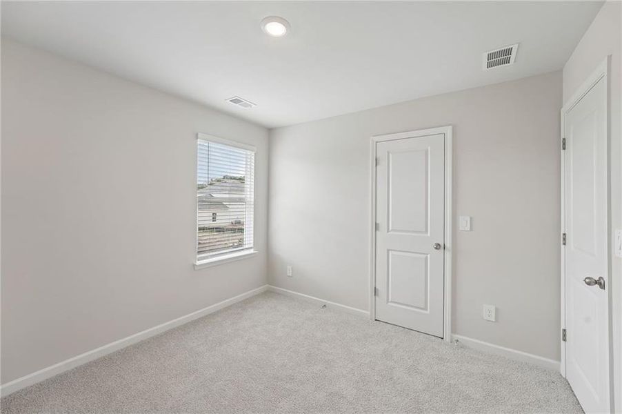 Spacious, unfurnished interior of a new home in Northwoods at Mirror Lake, Villa Rica (Image 45).