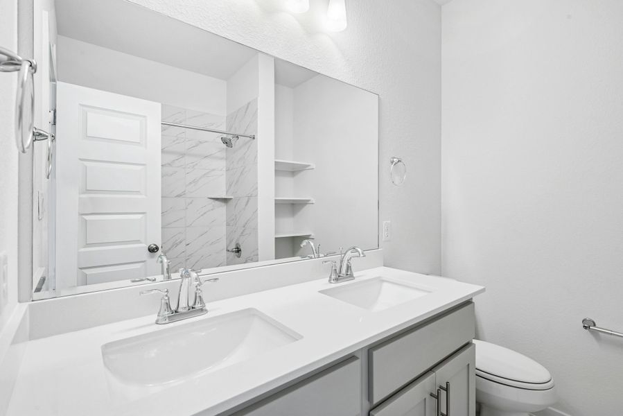 Furnished interior view inside a new home in The Colony, Bastrop (Image 14). Furnished interior view inside a new home in The Colony, Bastrop (Image 14).