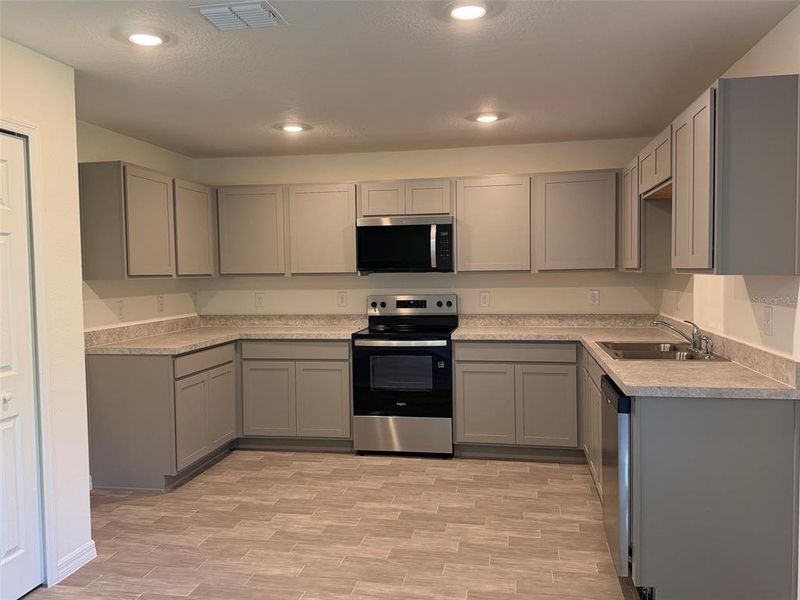 Furnished interior view inside a new home in , Poinciana (Image 4). Furnished interior view inside a new home in , Poinciana (Image 4).
