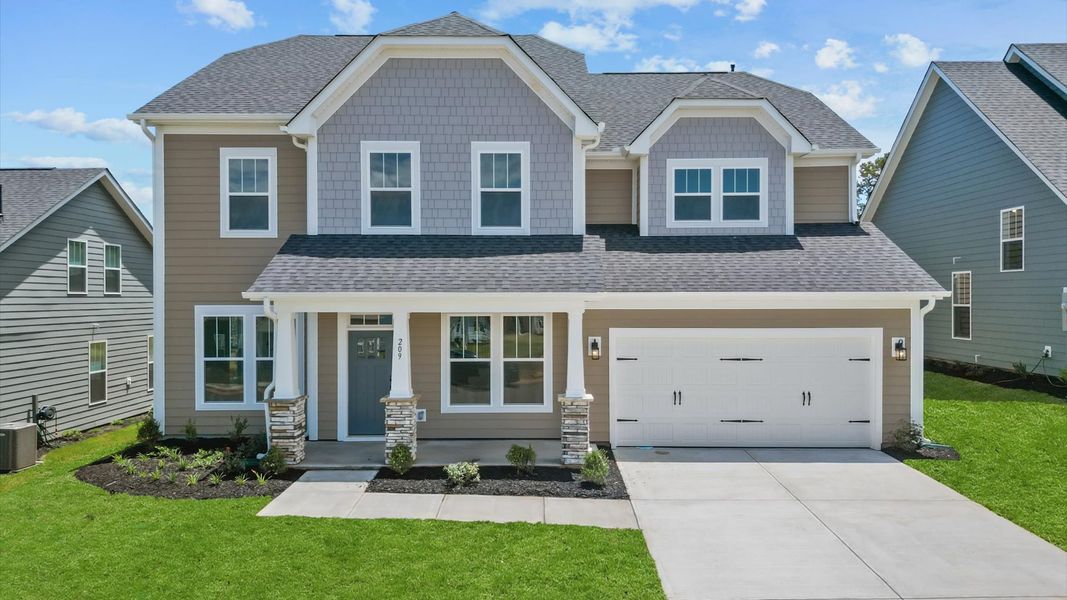 Representative exterior photo of a completed home built from the Stonehaven by DRB Homes in Pinebrook, Woodruff, SC (Image 22).