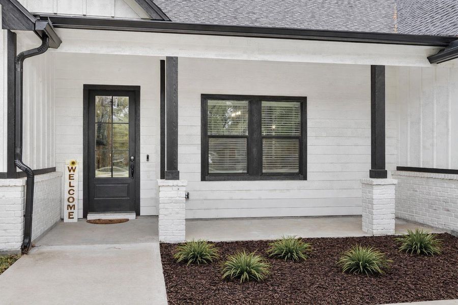 Virtually edited to show fresh landscaping.