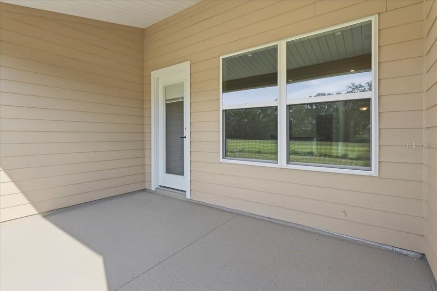 Exterior details and patio area of a home in Kirkland Farms, Alachua (Image 24).