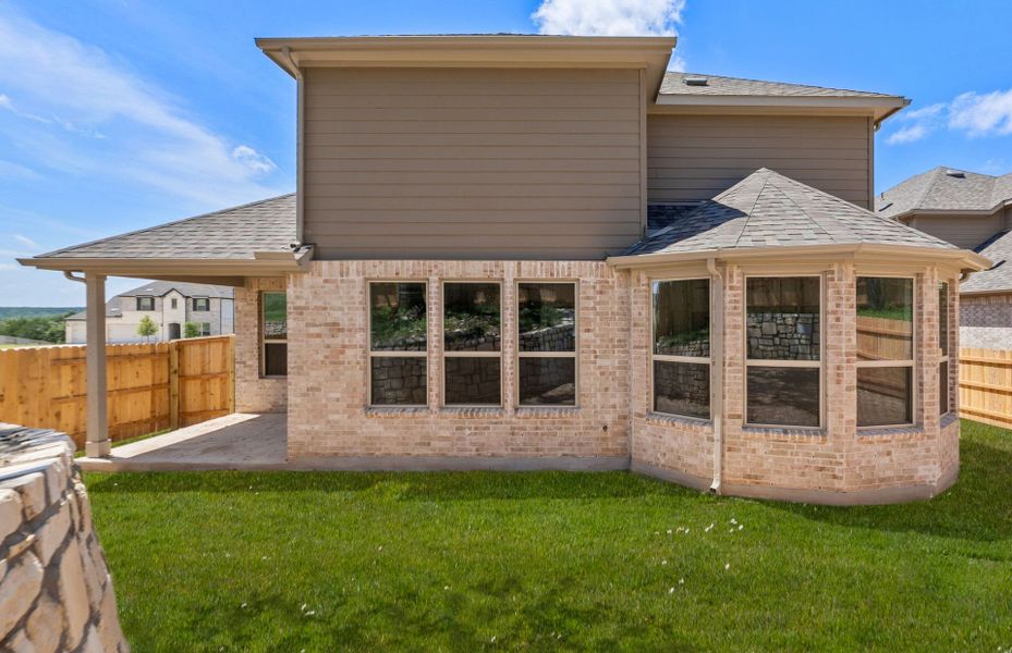 Exterior details and patio area of a home in Crescent Bluff, Georgetown (Image 25).