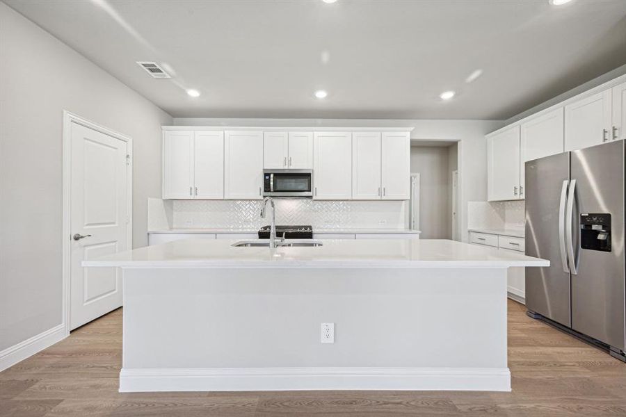 Photo is not of the actual home, but is an inspirational photo of builder’s model home and may depict options, furnishings, and/or decorator features that are not included.