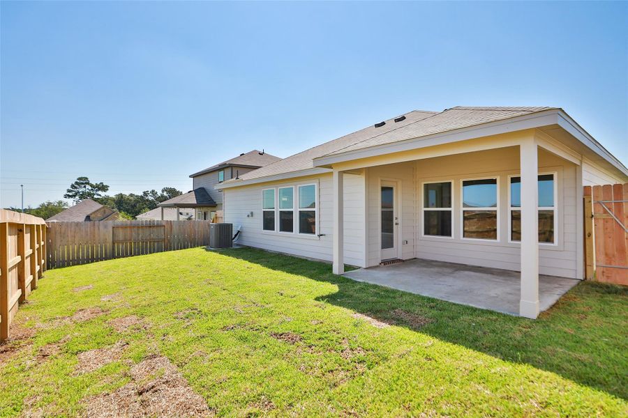Front exterior of a new home in Mostyn Springs, Magnolia, TX, highlighting curb appeal (Image 1). Front exterior of a new home in Mostyn Springs, Magnolia, TX, highlighting curb appeal (Image 1).