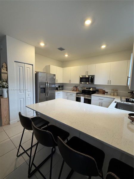 Furnished interior view inside a new home in , Coral Springs (Image 8). Furnished interior view inside a new home in , Coral Springs (Image 8).