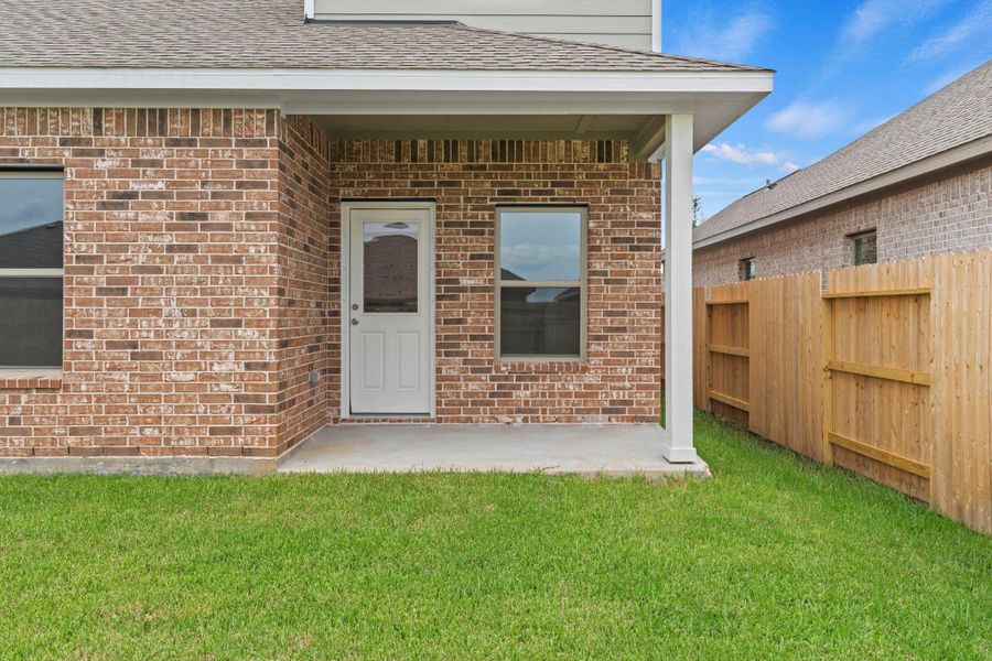 Exterior details and patio area of a home in Windrose Green, Angleton (Image 23). Exterior details and patio area of a home in Windrose Green, Angleton (Image 23).
