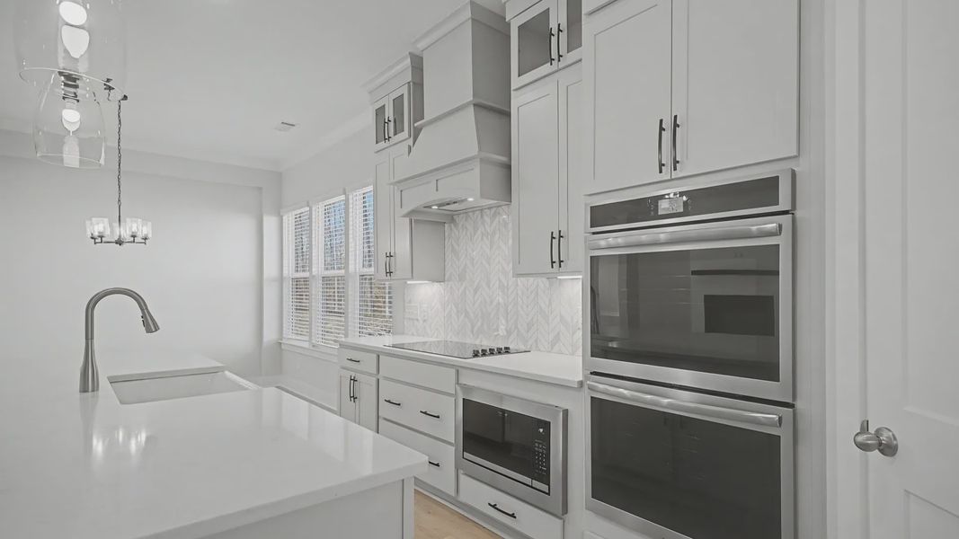 Double wall oven and upgraded range with hood Double wall oven and upgraded range with hood