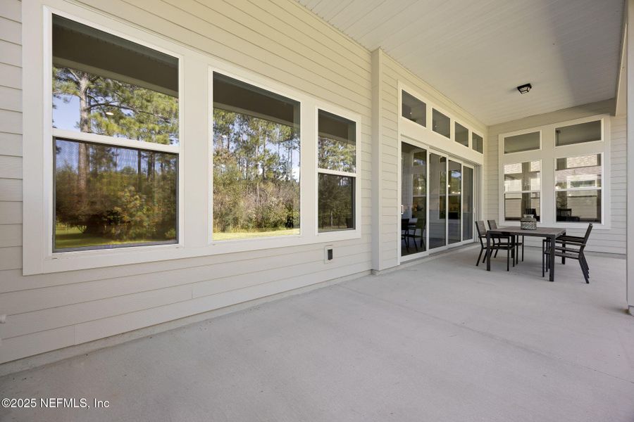Exterior details and patio area of a home in Amelia National, Fernandina Beach (Image 3).