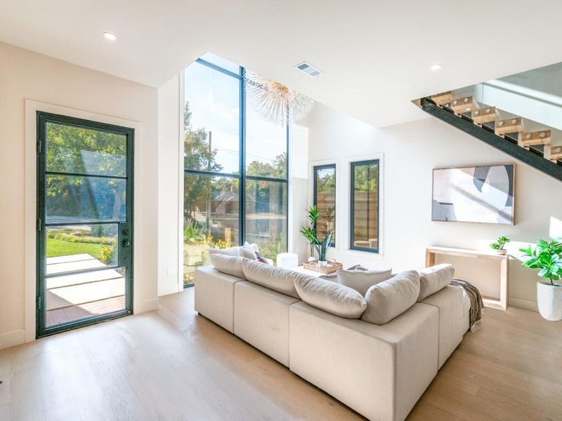 First Floor Living Area with Large Scale windows for natural light First Floor Living Area with Large Scale windows for natural light