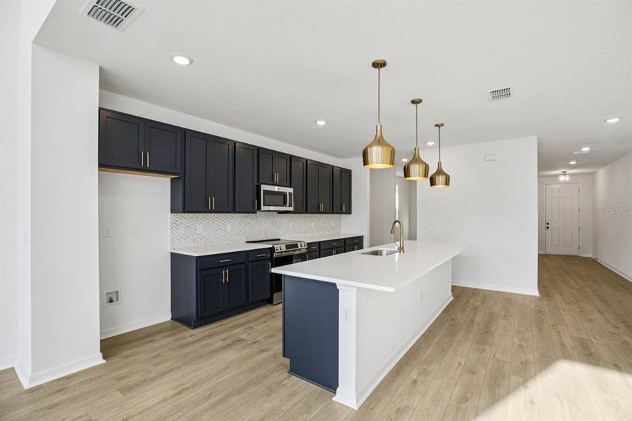 Furnished interior view inside a new home in Northlake at Ovation, Winter Garden (Image 3).