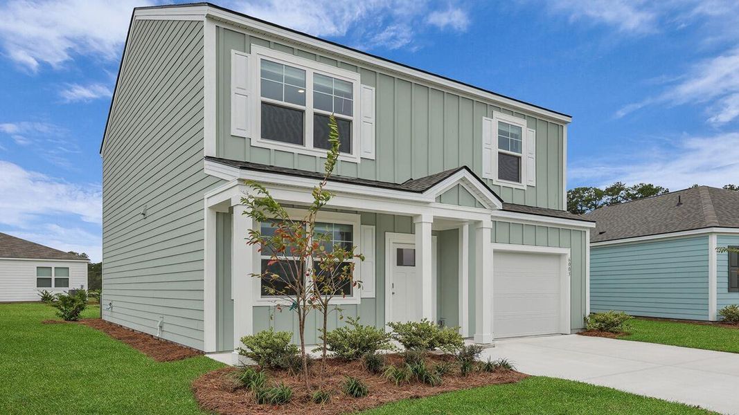 Front exterior of a new home in Hillcrest, Ravenel, SC, highlighting curb appeal (Image 2).