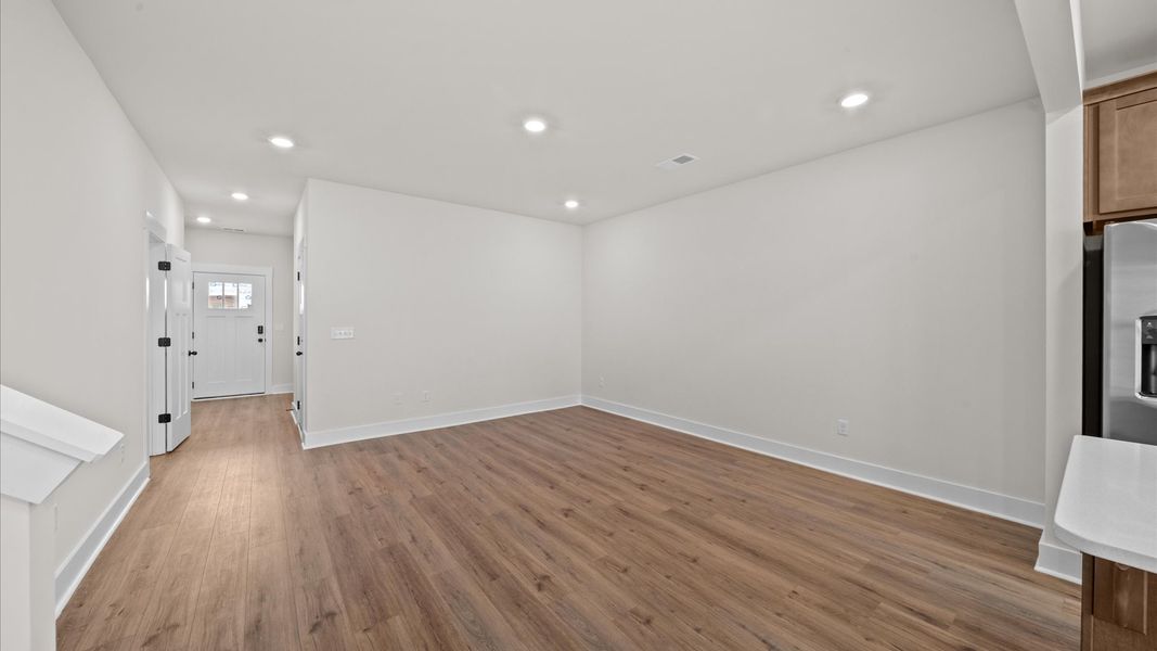 Accomplished layout centers around a spacious family room with exceptional flow and flexibility Accomplished layout centers around a spacious family room with exceptional flow and flexibility