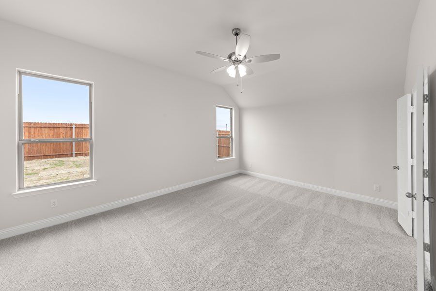 Representative exterior photo of a completed home built from the Kingston by Impression Homes in Timberbrook, Justin, TX (Image 15).