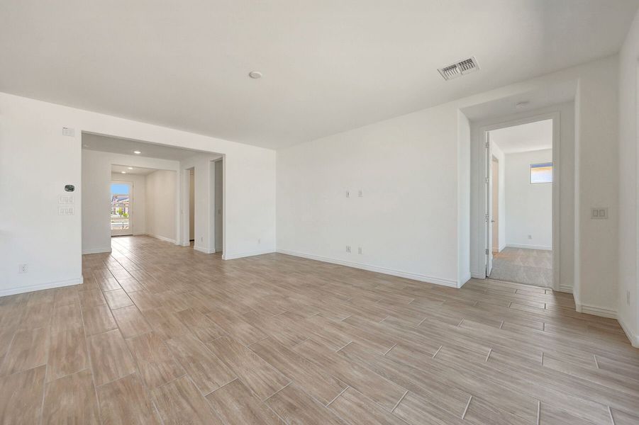 Spacious, unfurnished interior of a new home in Miravida, Surprise (Image 13).