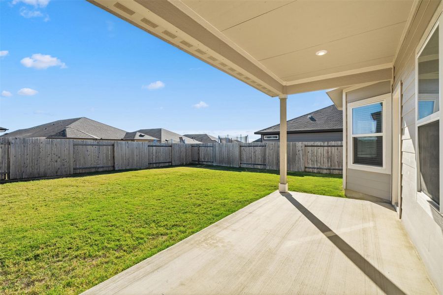 Exterior details and patio area of a home in Butler Farms - Reserve Collection, Liberty Hill (Image 24).