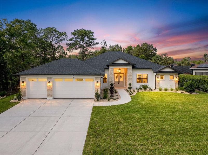 Front exterior of a new home in , Homosassa, FL, highlighting curb appeal (Image 33). Front exterior of a new home in , Homosassa, FL, highlighting curb appeal (Image 33).