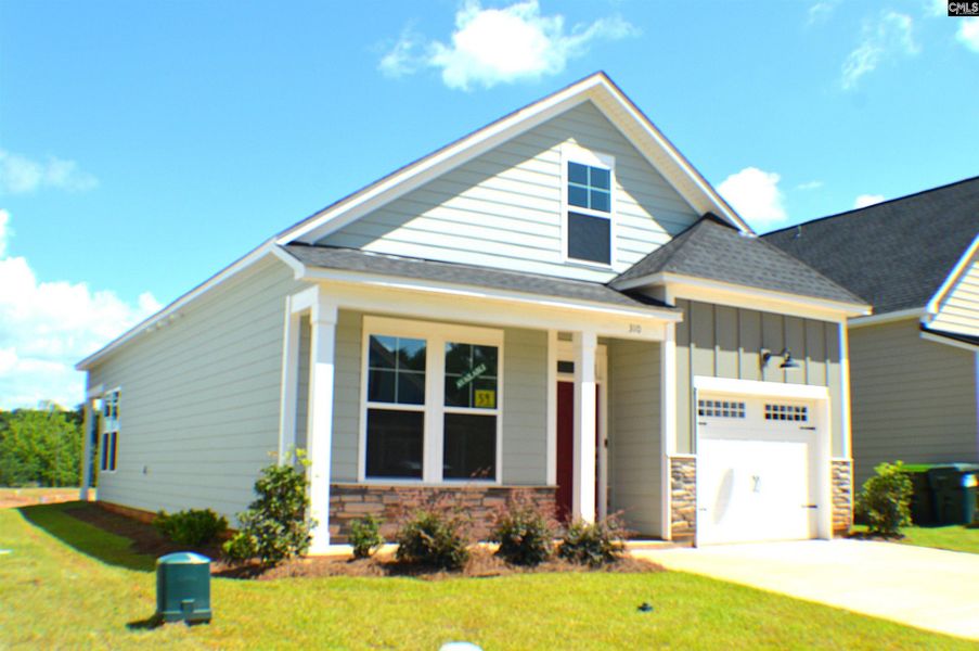 Front exterior of a new home in Bickley Station, Irmo, SC, highlighting curb appeal (Image 18).