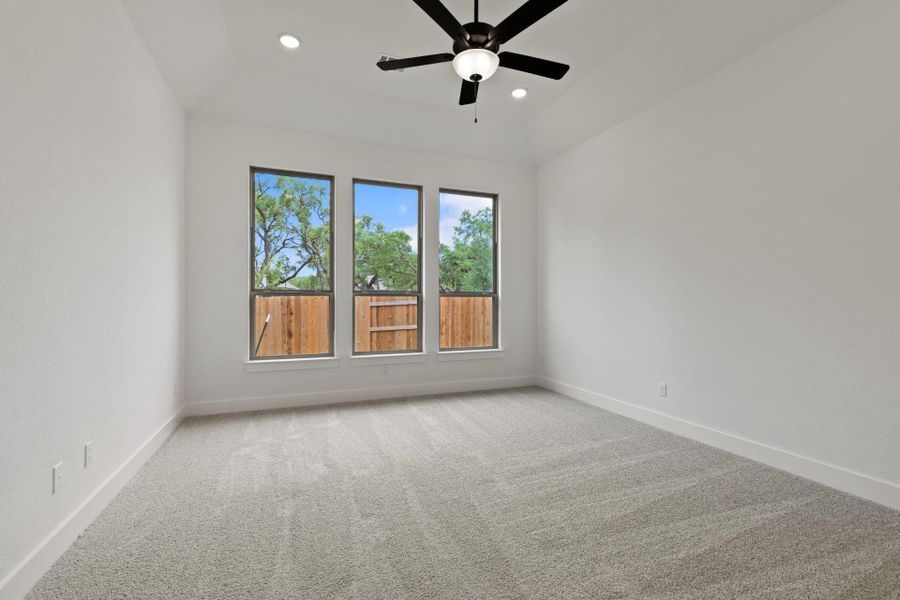 Primary Bedroom with elevated ceiling