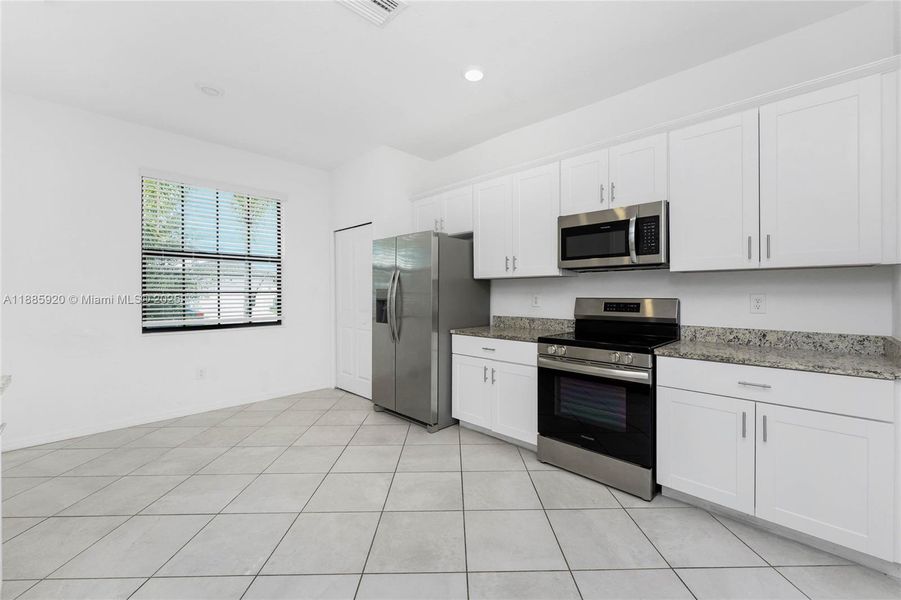 Furnished interior view inside a new home in , Port Charlotte (Image 7).