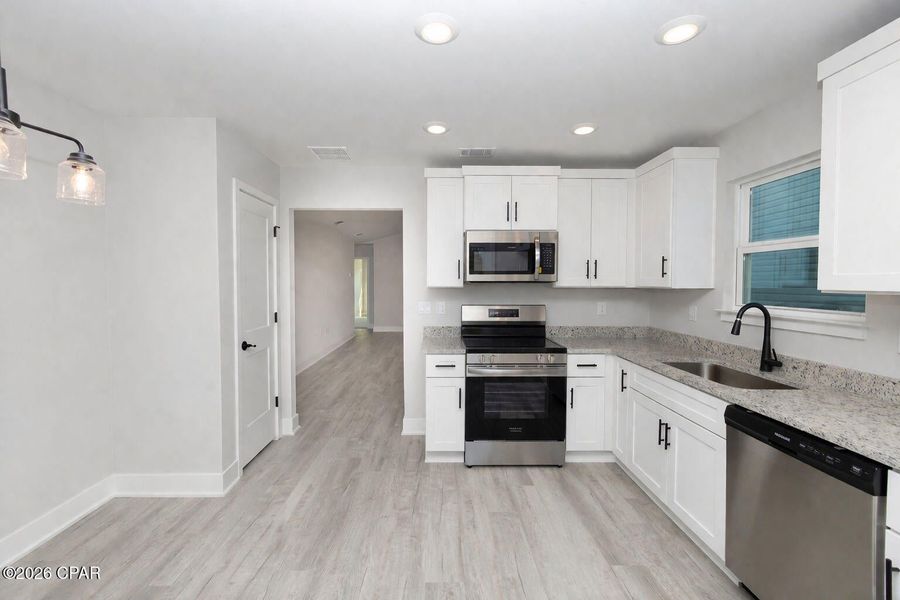 Furnished interior view inside a new home in Fox Glenn, Panama City (Image 8).