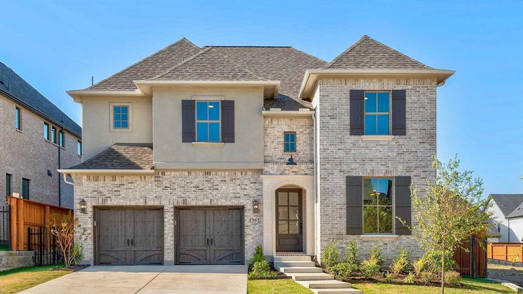 Front exterior of a new home in Fields 50', Frisco, TX, highlighting curb appeal (Image 1). Front exterior of a new home in Fields 50', Frisco, TX, highlighting curb appeal (Image 1).