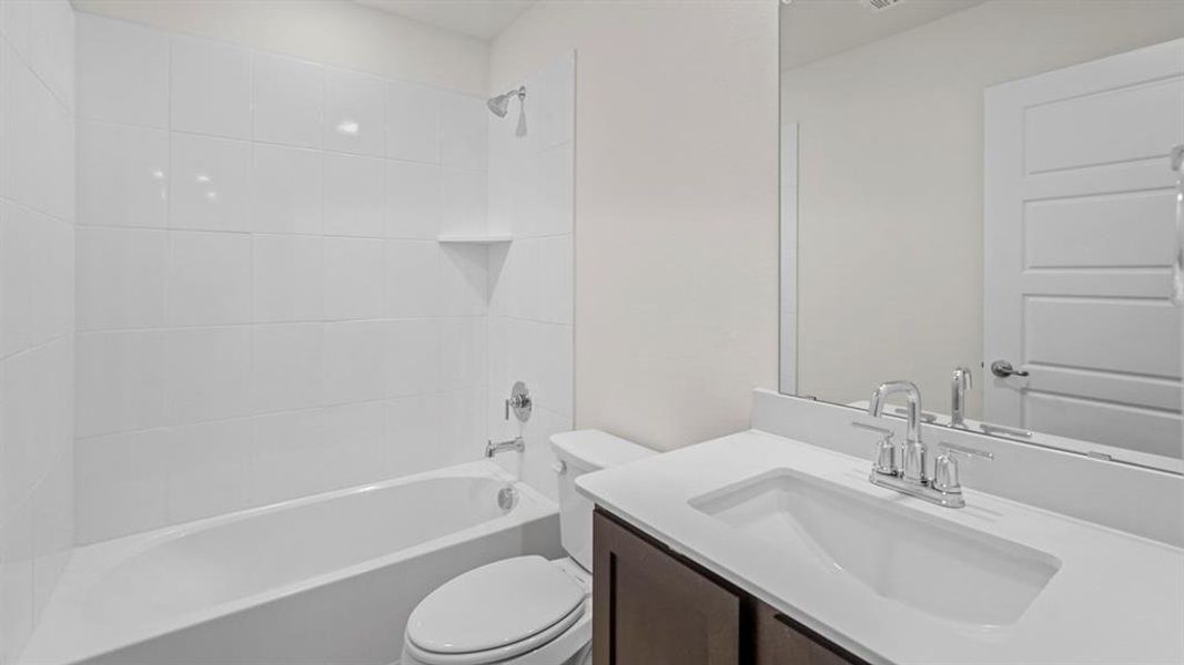 Full bathroom with tub / shower combination and vanity Full bathroom with tub / shower combination and vanity