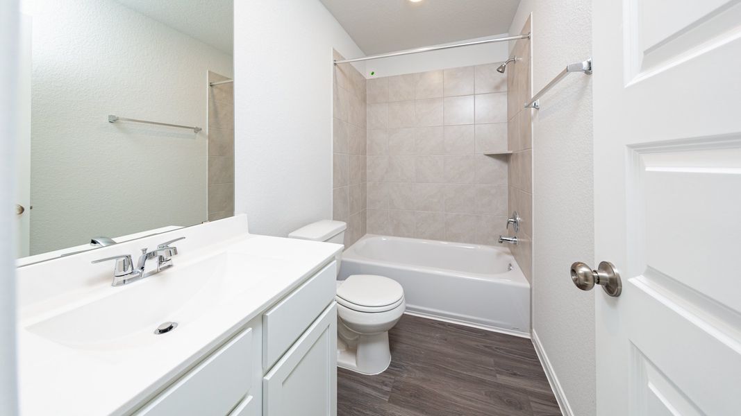 Representative furnished interior of a home built from the The Hawthorn by Legend Homes in Rocky Creek Crossing, Crowley (Image 11).