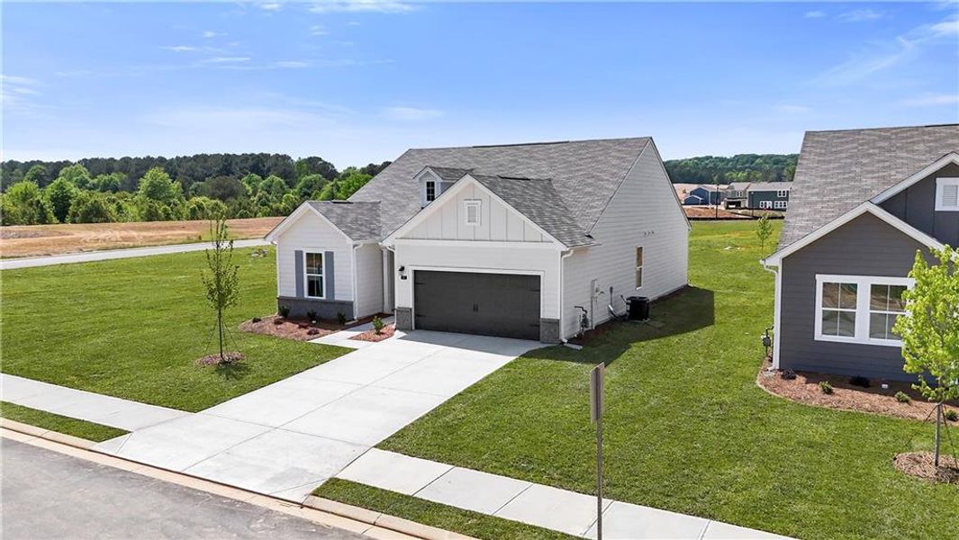 Front exterior of a new home in Three Rivers, Rome, GA, highlighting curb appeal (Image 22).