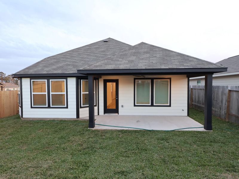Exterior details and patio area of a home in Magnolia Ridge, Magnolia (Image 20). Exterior details and patio area of a home in Magnolia Ridge, Magnolia (Image 20).