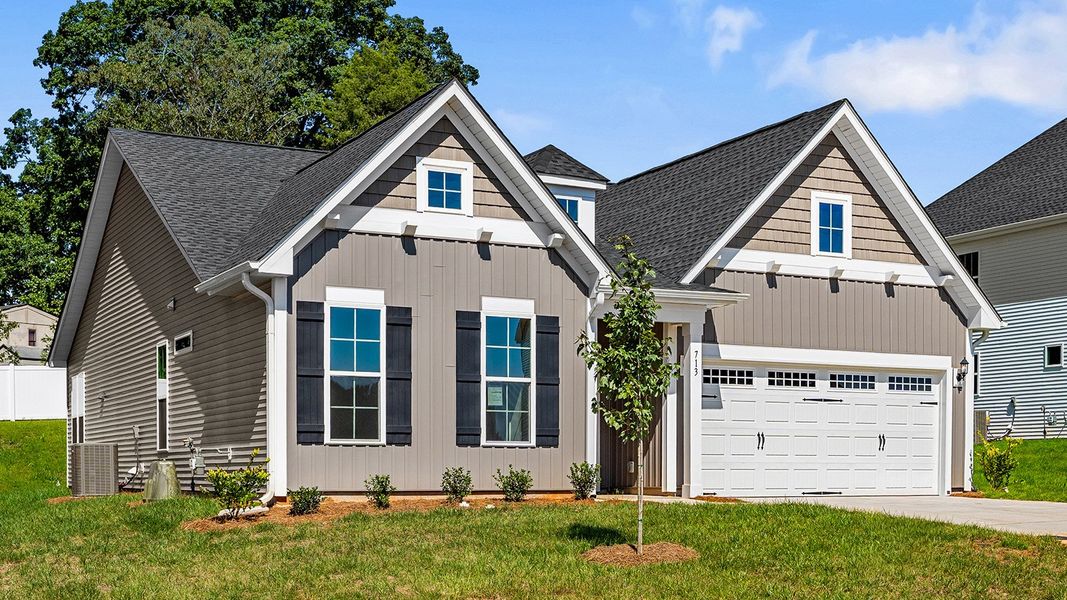 Front exterior of a new home in Hanes Lake, Winston-Salem, NC, highlighting curb appeal (Image 18).