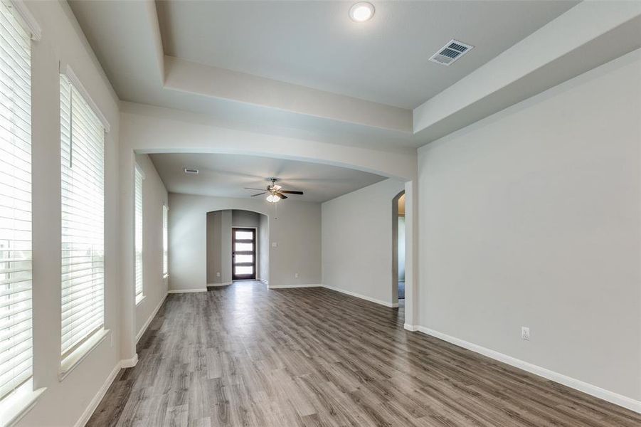 The open-concept layout is enhanced by luxury vinyl plank flooring throughout the main living areas. The open-concept layout is enhanced by luxury vinyl plank flooring throughout the main living areas.