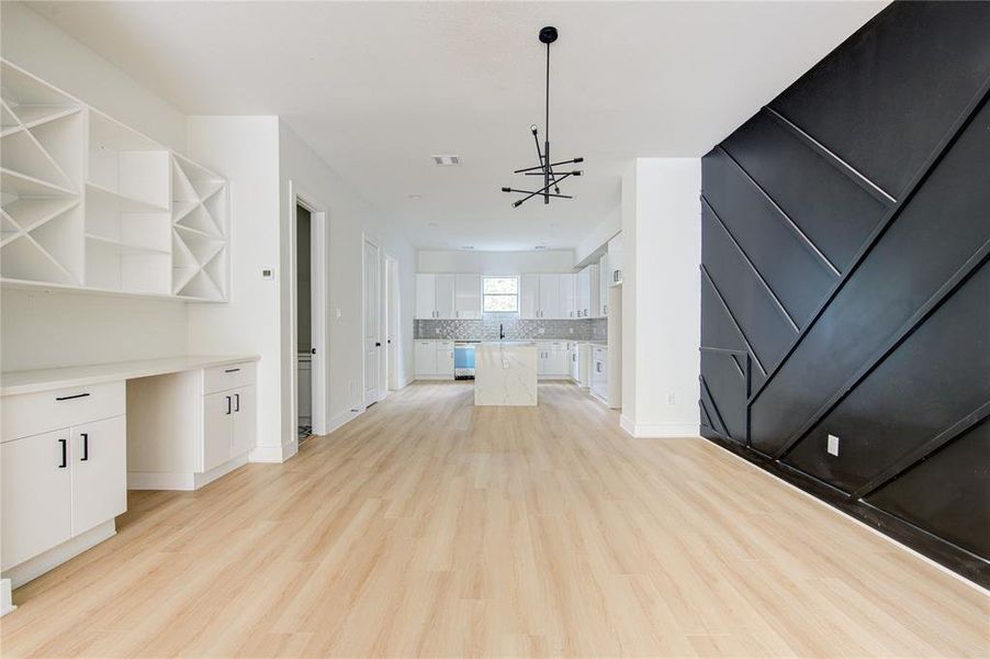 Beautiful accent wall and dry bar in the dining room