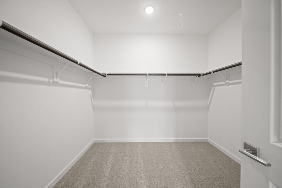 Primary walk-in closet (*Photo not of actual home and used for illustration purposes only.) Primary walk-in closet (*Photo not of actual home and used for illustration purposes only.)