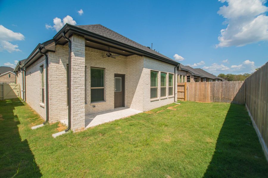 Front exterior of a new home in , Conroe, TX, highlighting curb appeal (Image 19). Front exterior of a new home in , Conroe, TX, highlighting curb appeal (Image 19).