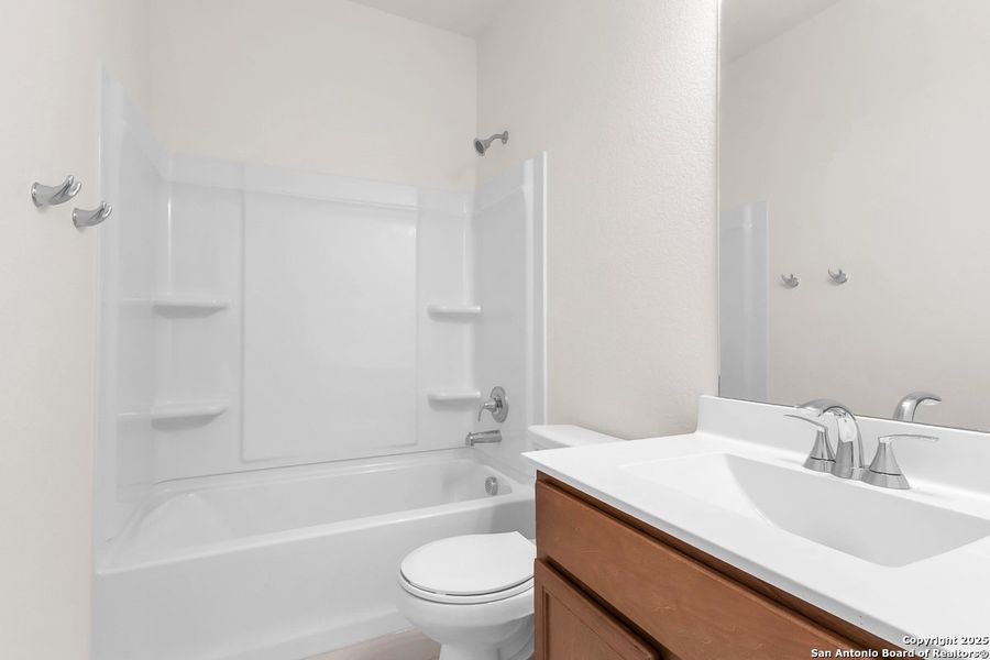 Furnished interior view inside a new home in Medina Crossing, Von Ormy (Image 3).