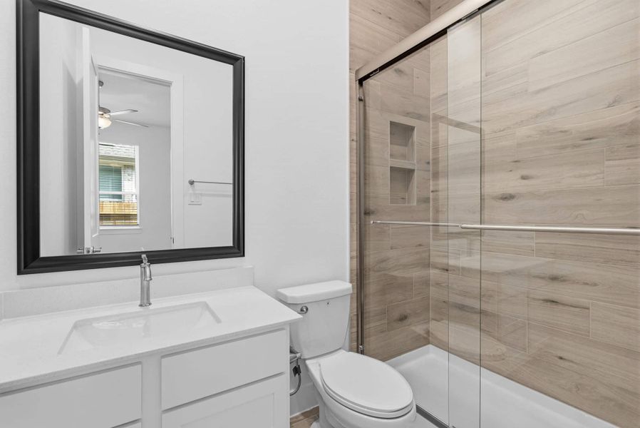 Furnished interior view inside a new home in Wood Leaf Reserve, Tomball (Image 6).