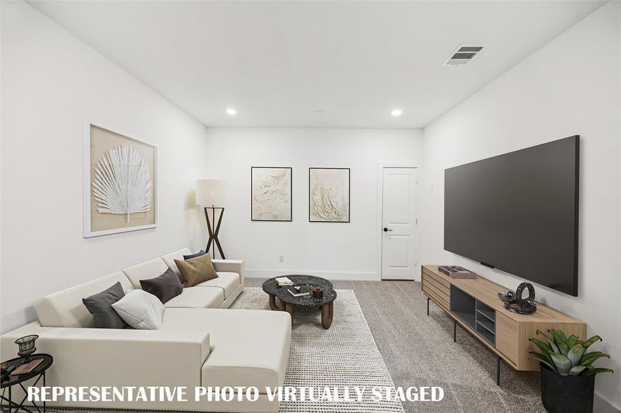 The media room with adjacent game room create the ultimate entertainment zone!  REPRESENTATIVE PHOTO VIRTUALLY STAGED