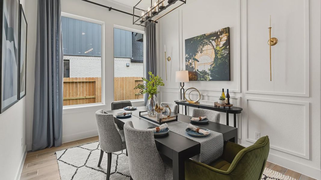 Representative furnished interior of a home built from the Hillcrest by Chesmar Homes in Artavia, Conroe (Image 8).