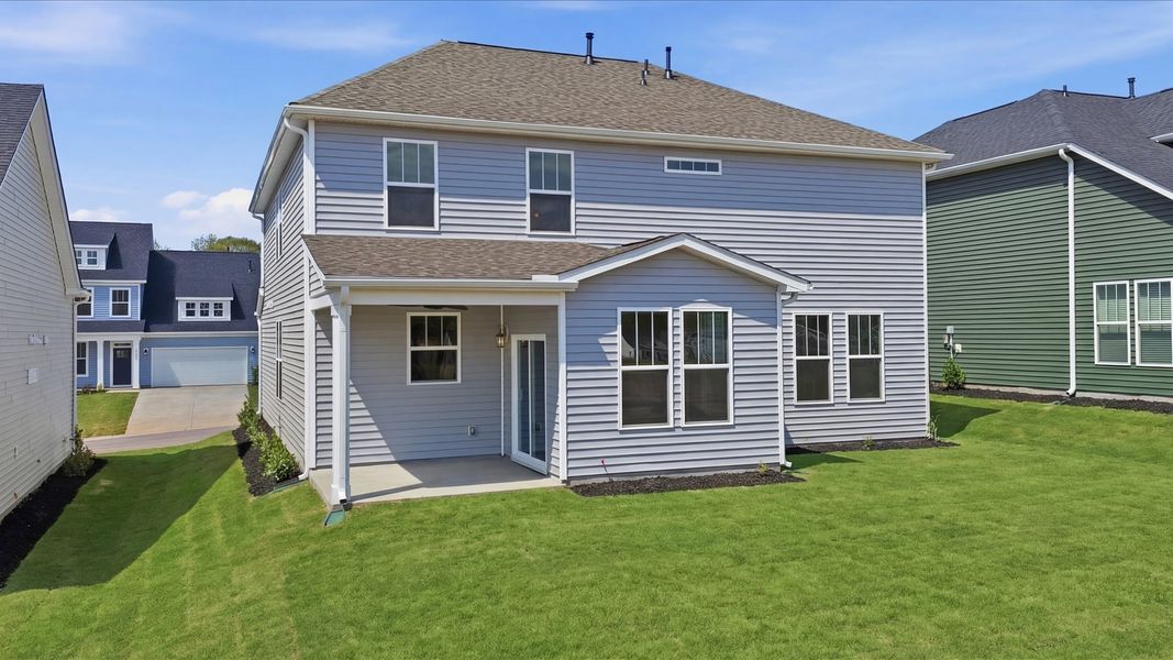Exterior details and patio area of a home in Iris Meadows, Moore (Image 4).