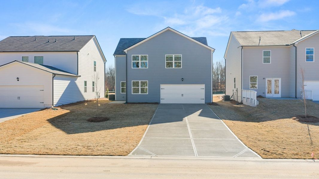 Representative exterior photo of a completed home built from the Carroll ll by D.R. Horton in Braselton Village, Braselton, GA (Image 15).