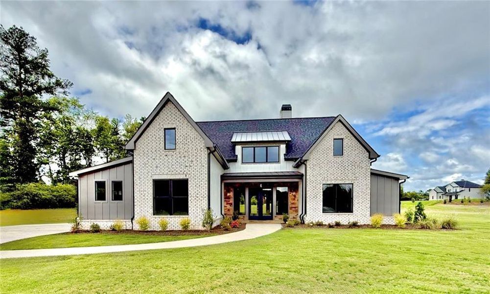 Front exterior of a new home in , Rydal, GA, highlighting curb appeal (Image 1).