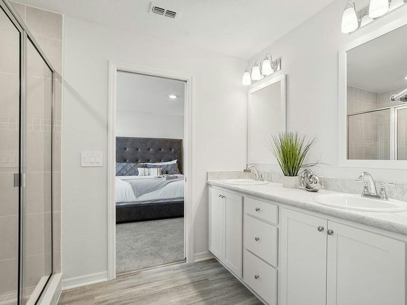Your suite is complete with an en-suite bath with dual vanities and a tiled shower - Wesley II by Highland Homes