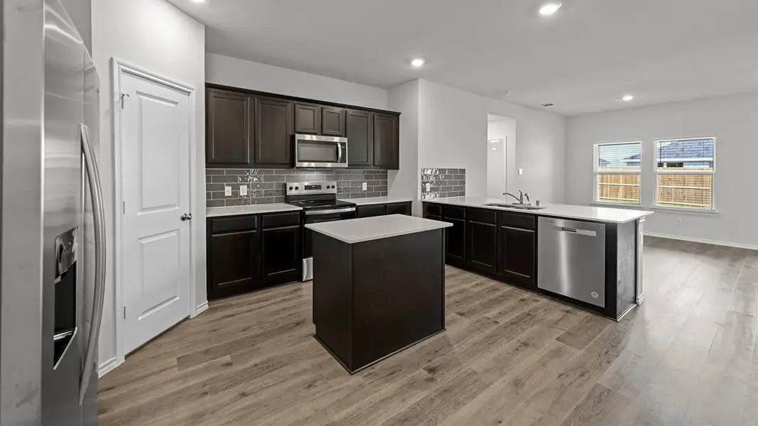 Furnished interior view inside a new home in Valor Farms, Royse City (Image 5).