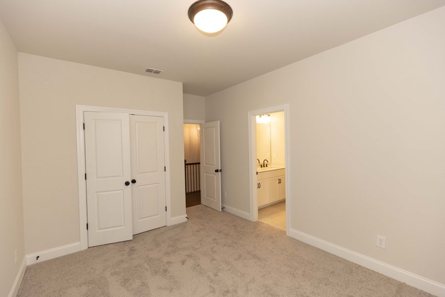 Representative unfurnished interior of a home built from the The Tensley by The Providence Group in Waterhaven, Cumming (Image 34).
