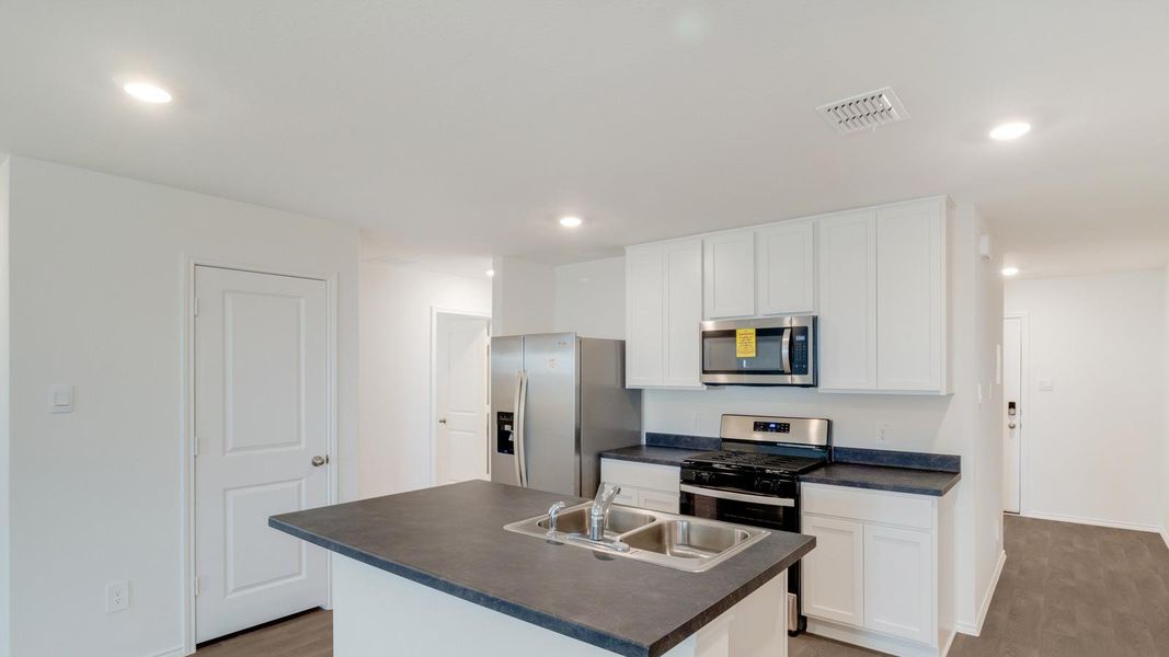 Furnished interior view inside a new home in Wayside, Uhland (Image 7).