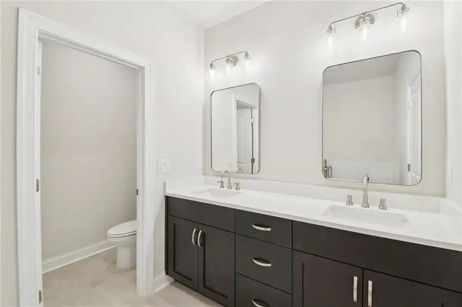 Furnished interior view inside a new home in Ward's Crossing Townhomes, Johns Creek (Image 9).