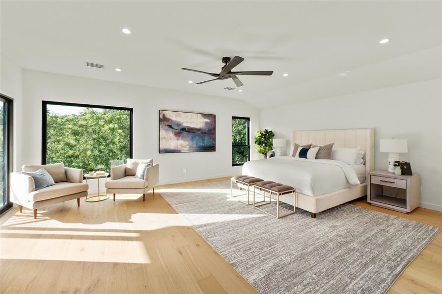 Bedroom with light wood finished floors, recessed lighting, a ceiling fan, baseboards, and lofted ceiling, sitting area